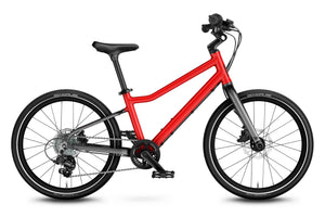 Woom EXPLORE 4 red 20 inch wheel 7-speed ultralight hybrid bike.