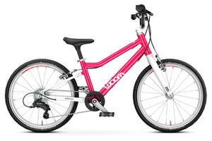 Woom GO 4 hot pink 20 inch wheel 7-speed ultralight children's bike.