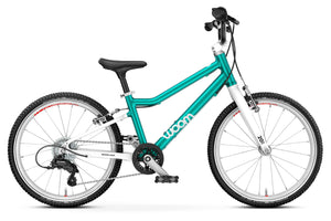 Woom GO 4 metallic turquoise 20 inch wheel 7-speed ultralight children's bike.