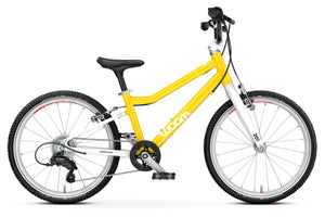 Woom GO 4 vibrant yellow 20 inch wheel 7-speed ultralight children's bike.