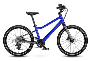 Woom EXPLORE 4 magnetic blue 20 inch wheel 7-speed ultralight hybrid bike.