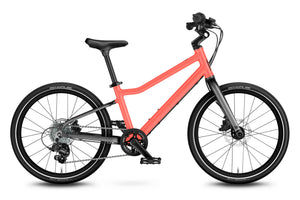 Woom EXPLORE 4 neon coral 20 inch wheel 7-speed ultralight hybrid bike.