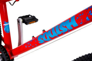 Squish 26 inch wheel red boys 8 speed lightweight hybrid mountain bike.