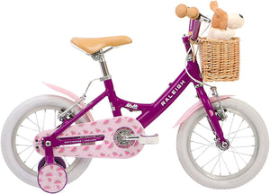 Raleigh Molli 14 inch wheel purple girls bike with wicker basket, stabilisers and cuddly soft toy dog.