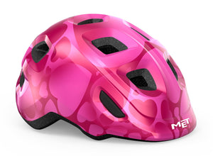 MET Hooray Pink Hearts kids helmet.
