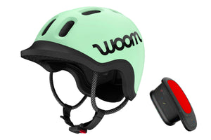 Woom READY mint kids' helmet with Woom READY helmet light