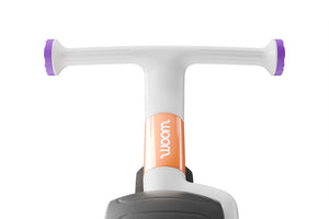 Woom WOW pop peach ultralight self-balancing balance bike.