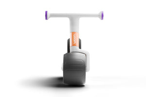 Woom WOW pop peach ultralight self-balancing balance bike.