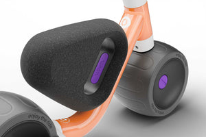 Woom WOW pop peach ultralight self-balancing balance bike.