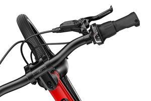 Woom EXPLORE 4 Shimano Revoshift  twist shifter for intuitive shifting.