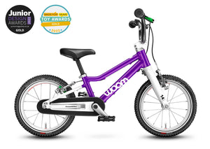 Award winning Woom 2 purple haze 14 inch wheel ultralight children's bike.