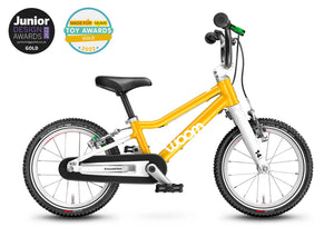 Award winning Woom 2 sunny yellow 14 inch wheel ultralight children's bike.