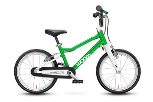 Woom 3 green 16 inch wheel ultralight children's bike.