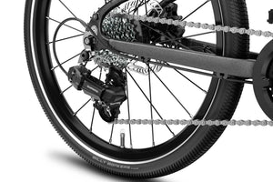 Woom EXPLORE4 Shimano Tourney 7-speed rear derailleur.