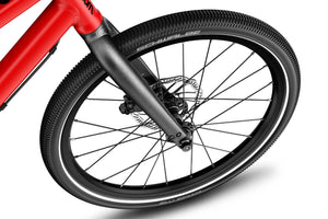 Woom EXPLORE 4 quick-release aluminium front wheel with sealed bearing hub and Schwalbe Billy Bonkers tyre.