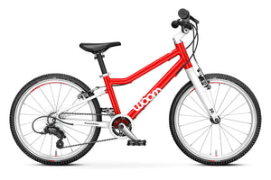 Woom 4 red 20 inch wheel 7 speed ultralight hybrid bike.