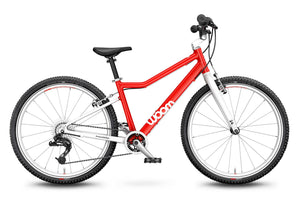 Woom 5 red 24 inch wheel 8 speed ultralight hybrid bike.