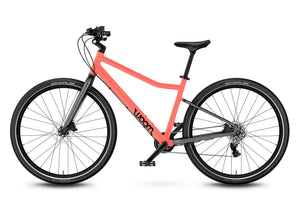 Woom EXPLORE 6 neon coral 26 inch wheel 8
-speed ultralight hybrid bike.