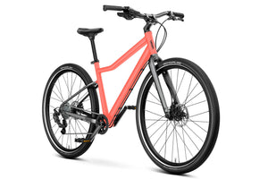 Woom EXPLORE 6 neon coral 26 inch wheel 8
-speed ultralight hybrid bike.