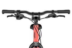 Woom EXPLORE 6 neon coral 26 inch wheel 8
-speed ultralight hybrid bike.