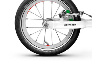 Woom GO 1 rear wheel with extra-narrow hub for added leg clearance.