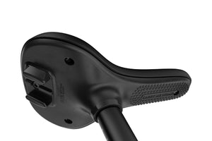 Woom GO 1 PLUS saddle featuring integrated GoPro mount and 'Carry Me Home' grip.