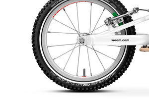 Woom GO 1 PLUS rear wheel with extra-narrow hub for added leg clearance.