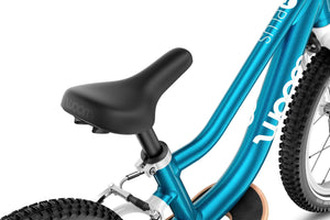 Woom GO 1 PLUS ergonomic gently curved banana-shaped saddle.