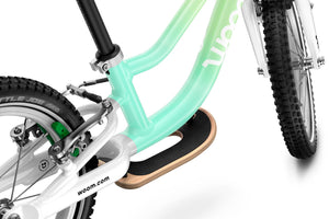 Woom GO 1 PLUS balance bike standard fitment surfboard footrest.