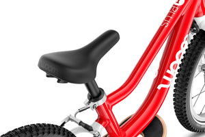 Woom GO 1 PLUS ergonomic gently curved banana-shaped saddle.