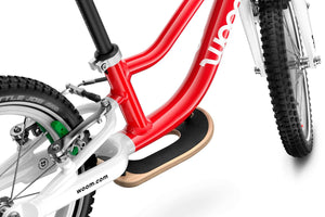 Woom GO 1 PLUS balance bike standard fitment surfboard footrest.