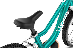 Woom GO 1 PLUS ergonomic gently curved banana-shaped saddle.