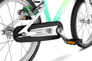 Woom GO 2 compact fully-enclosed chainguard.