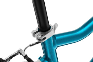 Woom GO 4 practical quick-release seatpost clamp.