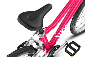 Woom GO 4 ergonomic saddle with integrated GoPro mount.
