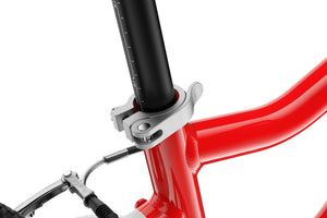 Woom GO 4 practical quick-release seatpost clamp.