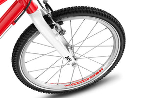 Woom GO 4 quick-release front wheel with Soopa Doopa Hoops rim and sealed bearing hub.