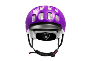 Front view of the Woom purple haze kids helmet showing rubber visor and Fidlock® magnetic closure system.
