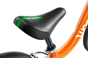 Woom 1 flame orange 12 inch wheel ultralight children's balance bike.