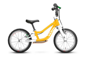 Woom 1 PLUS sunny yellow 14 inch wheel ultralight children's balance bike.