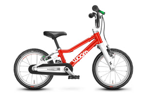 Woom 2 red 14 inch wheel ultralight children's bike.
