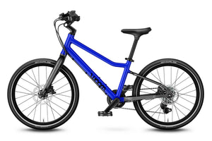 Woom EXPLORE 4 magnetic blue 20 inch wheel 7-speed ultralight hybrid bike.