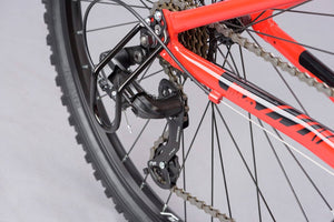 Ridgeback MX26 26 inch wheel red boys 21 speed front suspension mountain bike.