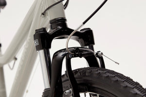 Ridgeback MX24 24 inch wheel light grey boys 21 speed front suspension mountain bike.