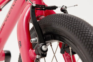 Ridgeback Dimension 14 inch wheel pink lightweight hybrid mountain bike.