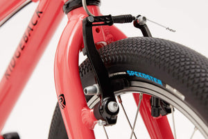 Ridgeback Dimension 16 inch wheel coral lightweight mountain bike.